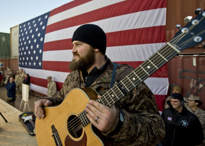 Entertainers on the USO Tour perform and greet the troops.